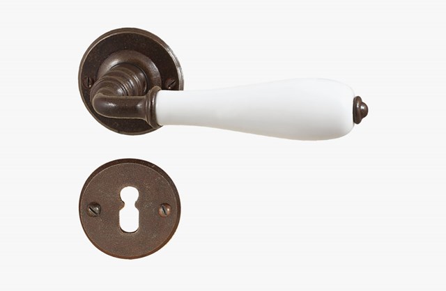 Iron/porcelain door handle